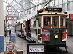 Tram in Glass Atrium